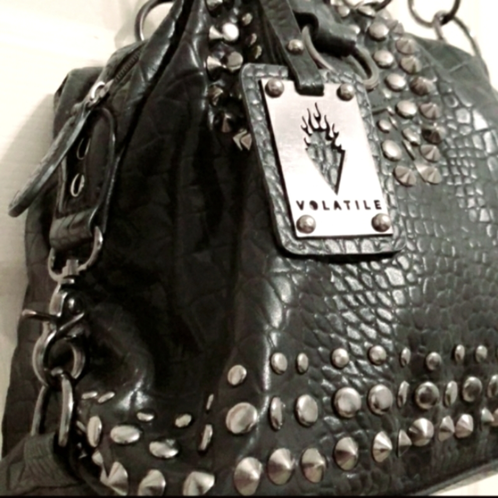 Volatile Metal studded black bag. Beautiful & Eye catching.